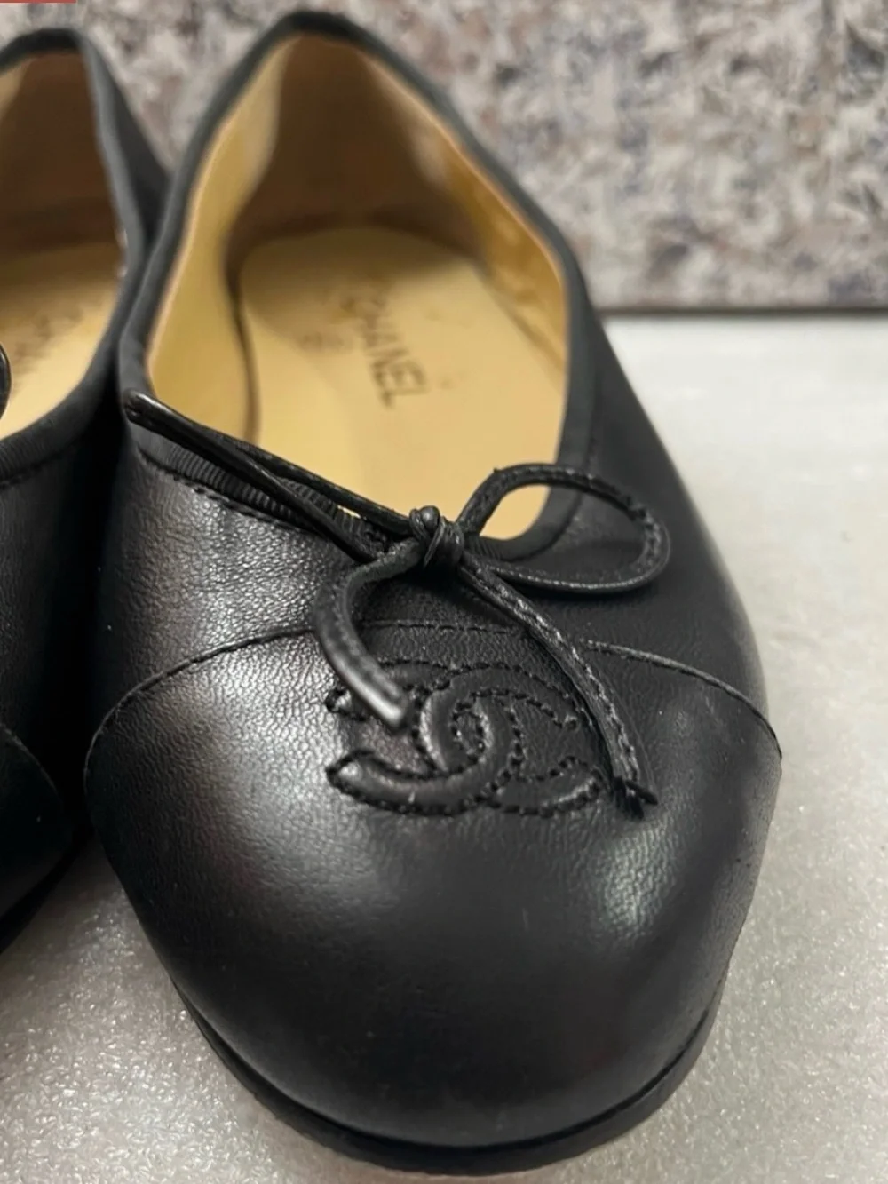 CHANEL Black Leather Ballet Flats with Bow and CC Motif